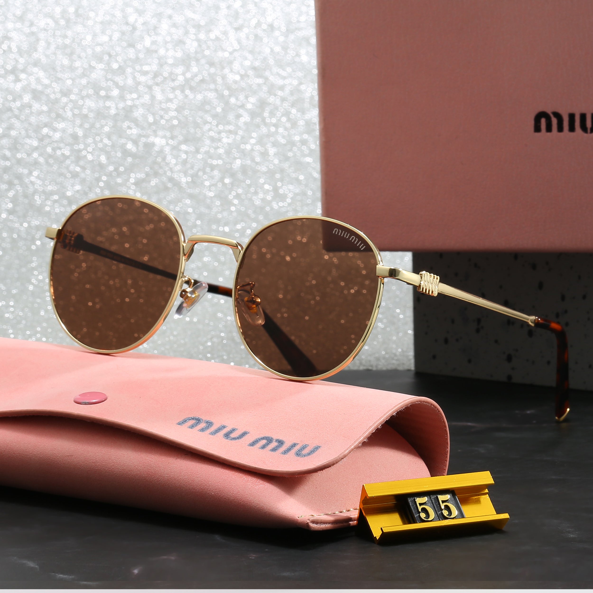 Miu Miu Round Sunglasses