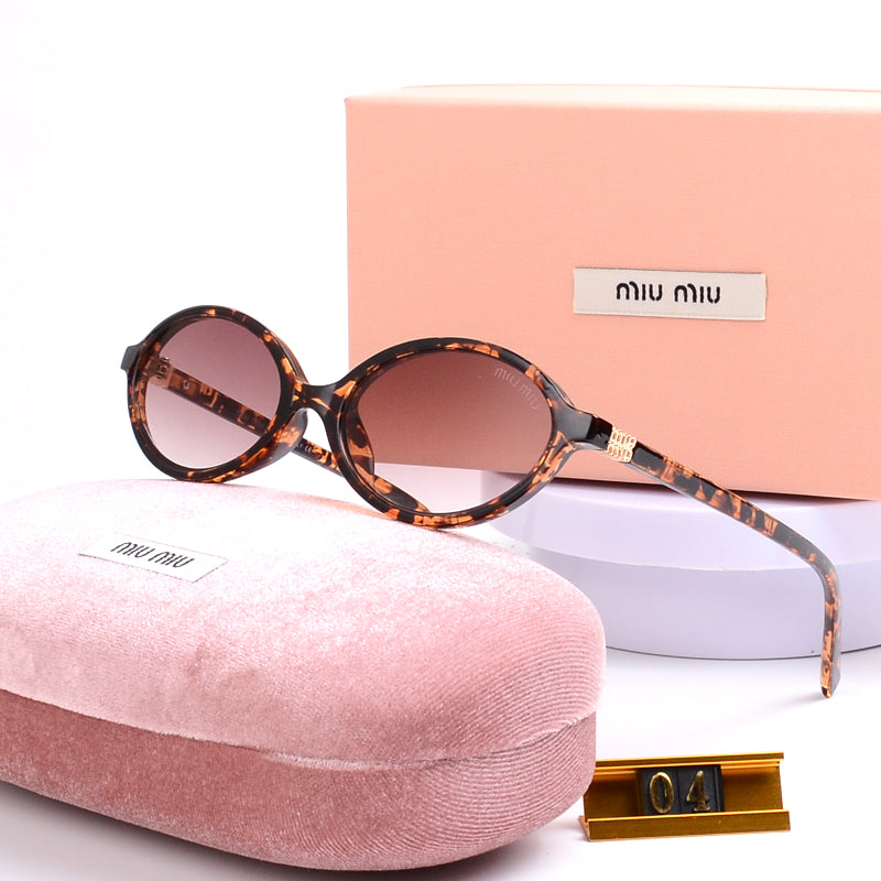 Miu Miu Regard Sunglasses