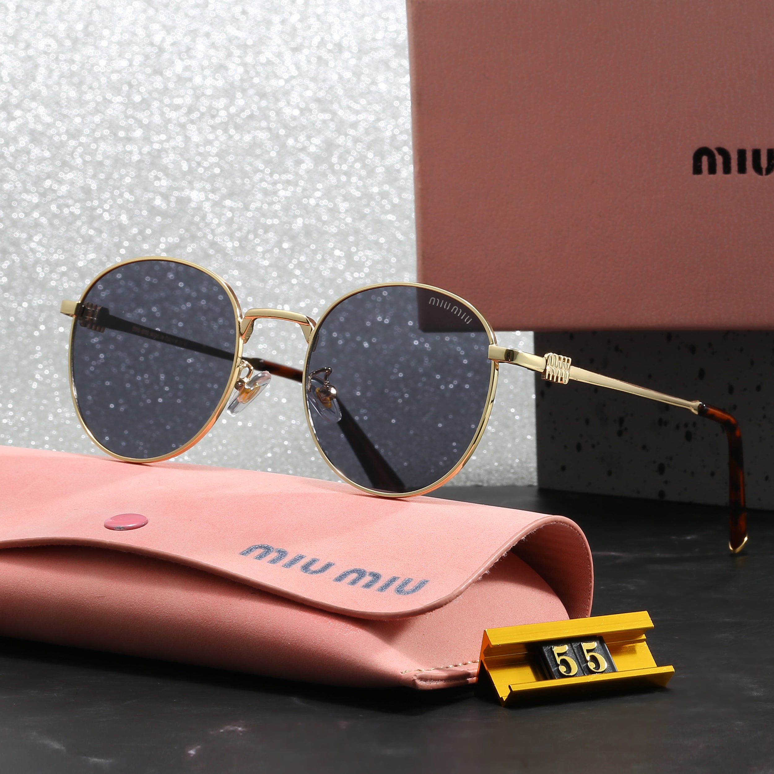 Miu Miu Round Sunglasses