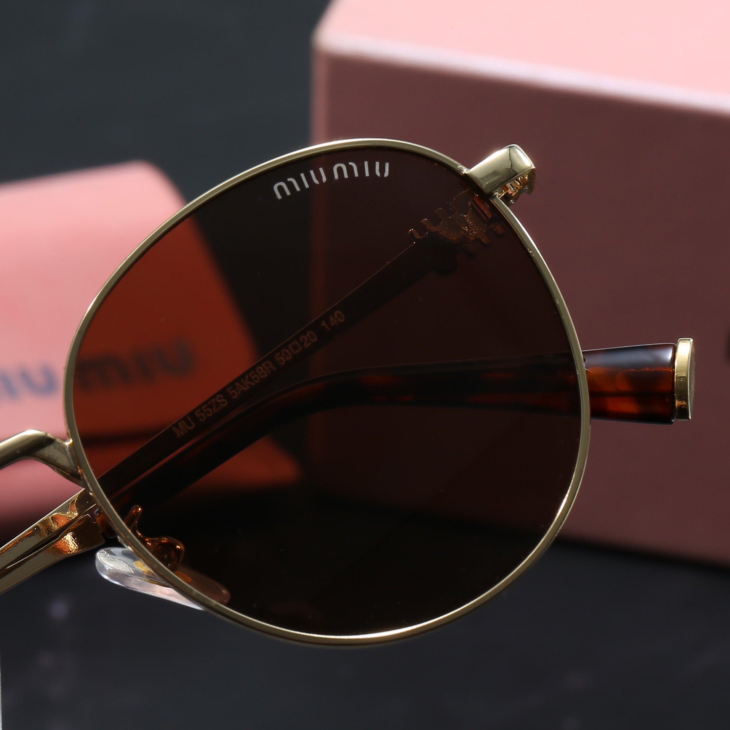 Miu Miu Round Sunglasses