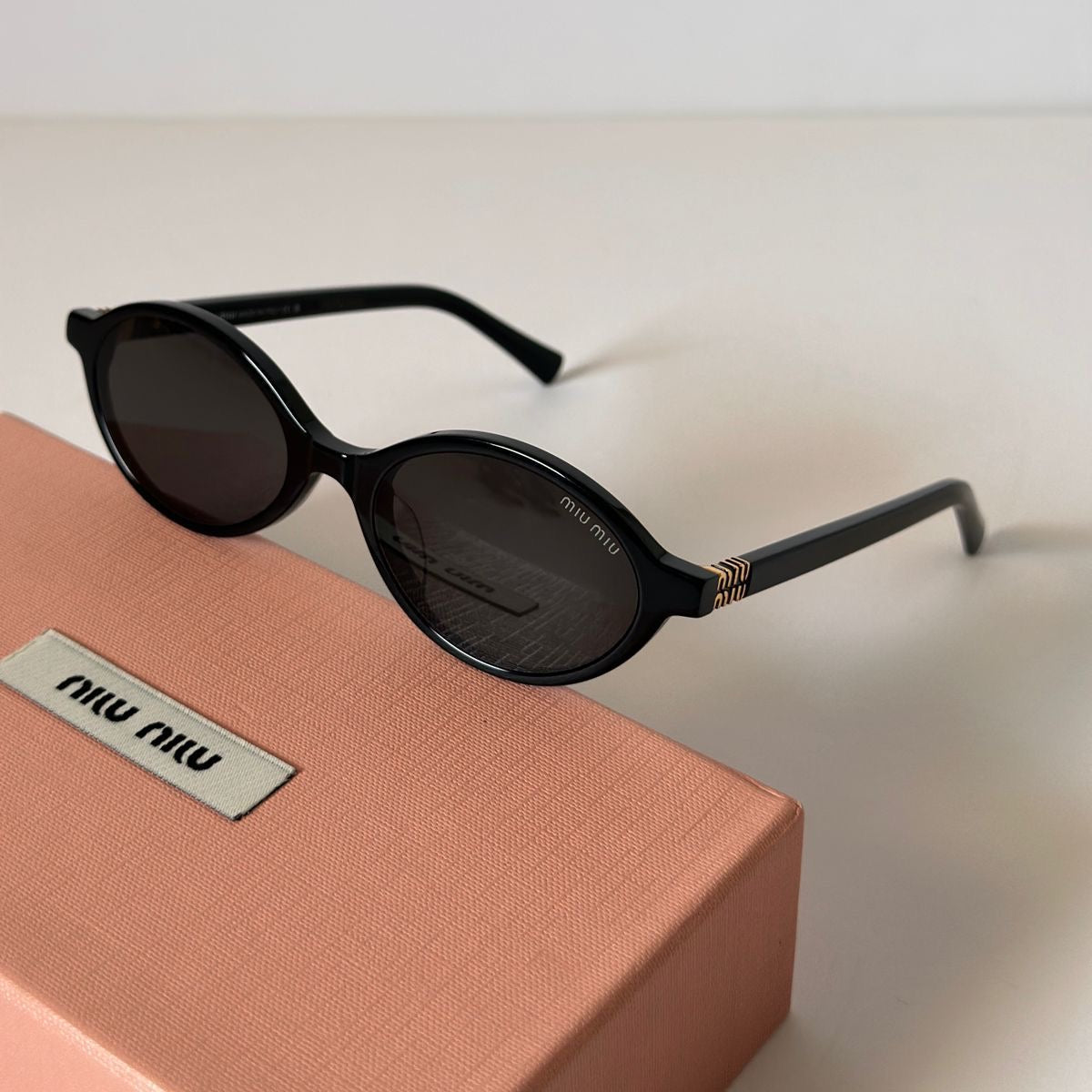 Miu Miu Regard Sunglasses