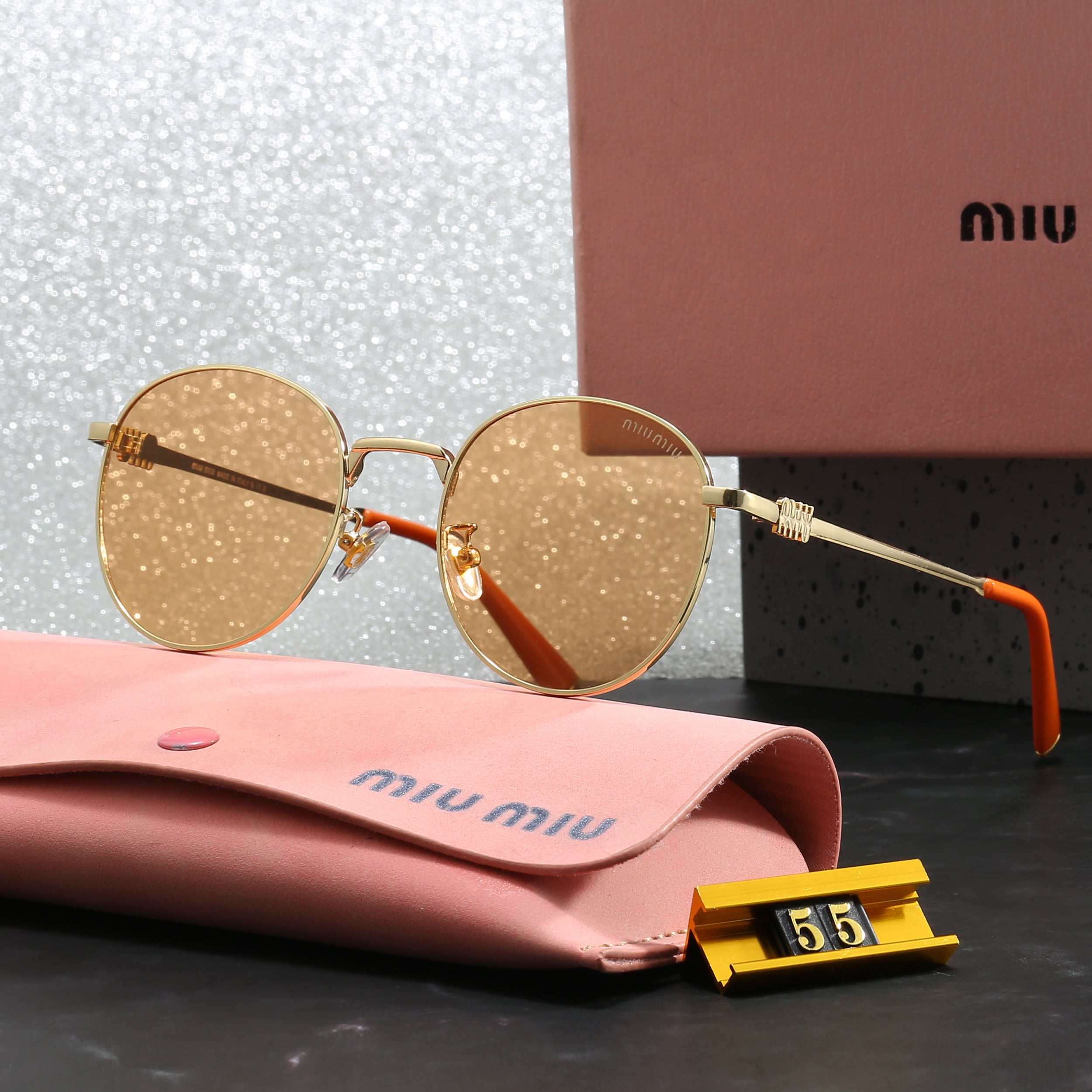 Miu Miu Round Sunglasses